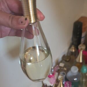 Jadore Gold-Accented Clear Glass Perfume Bottle - Pale Yellow Fragrance